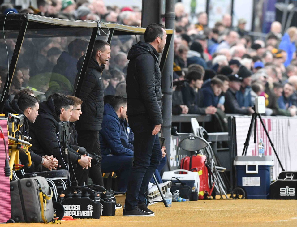 Christian Fuchs on touchline during Colchester game.