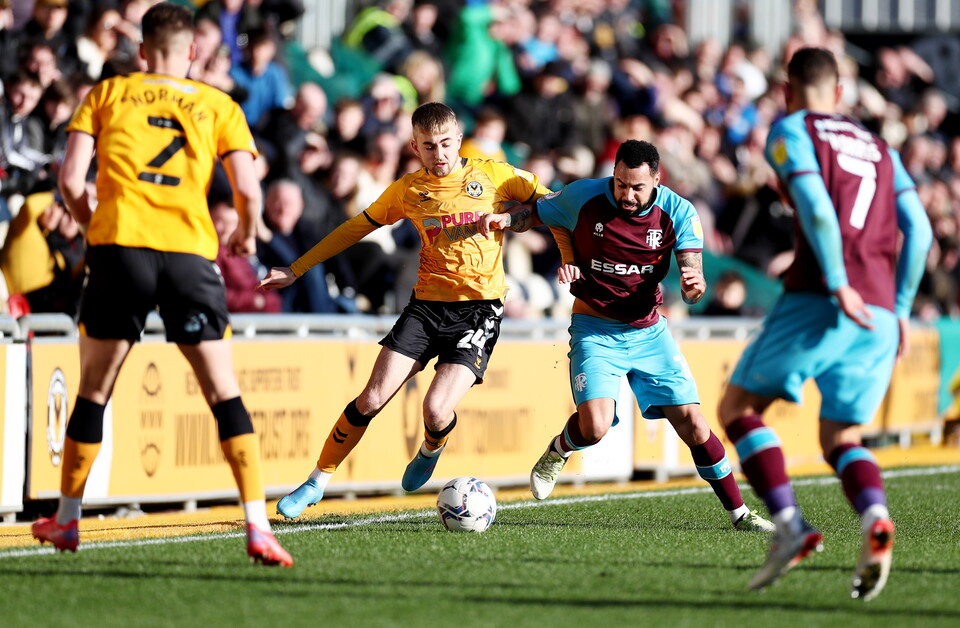 Jake Cain of Newport County and Kane Hemmings of Tranmere Rovers.