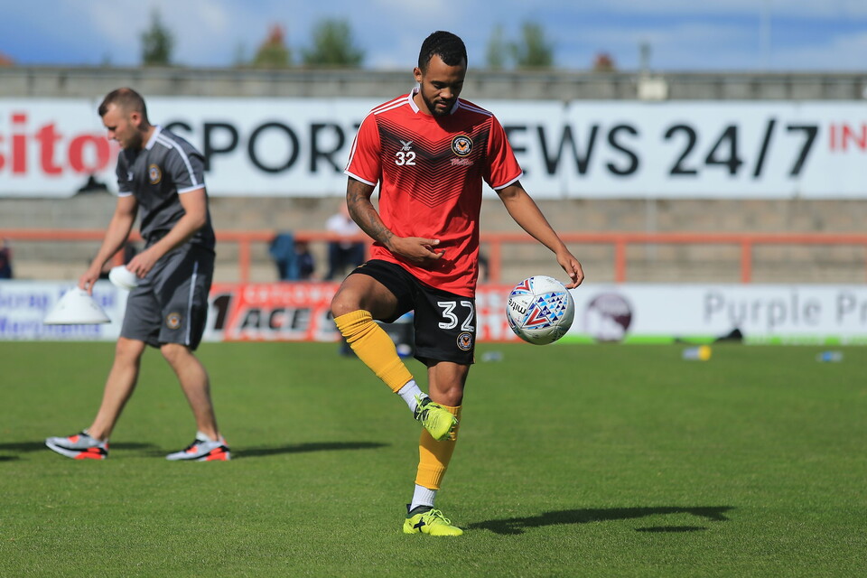 Calaum Jahraldo-Martin of Newport County warming up
