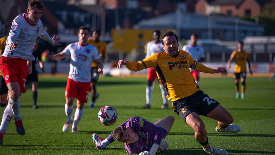 Aaron wildig wins a penalty for Newport County