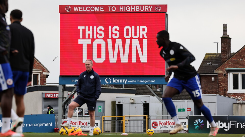 Image of Fleetwood Town scoreboard with 'This is our Town' on it.